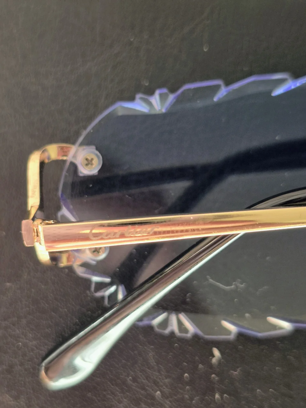 Cartier Rimless Sunglasses with Blue Gradient Lenses